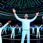 A diverse group of cheerful avatars, fully clothed in vibrant, futuristic and modest attire, actively engaging in an interactive metaverse music festival. They are in a dynamic virtual concert arena filled with glowing digital art installations, holographic displays, and musical note effects. Avatars are seen moving, raising their hands, and interacting with floating digital objects, showcasing collective participation and excitement. The atmosphere is energetic and joyful. safe for work, appropriate content, fully clothed, family-friendly, perfect anatomy, correct proportions, natural poses, well-formed hands, proper finger count, natural body proportions, professional photography, high quality, cinematic lighting.